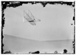 TITLE:  [Wilbur gliding to the right, bottom view of glider]
CALL NUMBER:  LC-W86- 13 [P&P] REPRODUCTION NUMBER:  LC-DIG-ppprs-00604 (digital file from original) LC-W861-13 (b&w film copy neg.) CREATED/PUBLISHED:  [1902 Oct. 10] PART OF:  Glass negatives from the Papers of Wilbur and Orville Wright REPOSITORY:  Library of Congress Prints and Photographs Division Washington, D.C. 20540 USA
