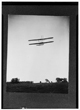 TITLE:  [Rear view of flight 46, Orville shown flying at a high altitude over Huffman Prairie, Dayton, Ohio.] <br />CALL NUMBER:  LC-W86- 105 [P&P] REPRODUCTION NUMBER:  LC-DIG-ppprs-00696 (digital file from original) LC-W861-105 (b&w film copy neg.) CREATED/PUBLISHED:  [1905 Oct. 4] PART OF:  Glass negatives from the Papers of Wilbur and Orville Wright REPOSITORY:  Library of Congress Prints and Photographs Division Washington, DC 20540 EUA