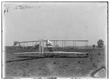 TITLE:  [Close-up view of machine on launching track at Huffman Prairie, Dayton, Ohio]<br />CALL NUMBER:  LC-W86- 27 [P&P] REPRODUCTION NUMBER:  LC-DIG-ppprs-00618 (digital file from original) LC-W861-27 (b&w film copy neg.) CREATED/PUBLISHED:  [1904 June or July] PART OF:  Glass negatives from the Papers of Wilbur and Orville Wright REPOSITORY:  Library of Congress Prints and Photographs Division Washington, DC 20540 EUA