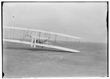 TITLE:  [Orville piloting the third flight of December 17, 1903; Kitty Hawk, North Carolina]
CALL NUMBER:  LC-W86- 37 [P&P] REPRODUCTION NUMBER:  LC-DIG-ppprs-00628 (digital file from original) LC-W861-37 (b&w film copy neg.) CREATED/PUBLISHED:  [1903 Dec. 17] PART OF:  Glass negatives from the Papers of Wilbur and Orville Wright REPOSITORY:  Library of Congress Prints and Photographs Division Washington, D.C. 20540 USA